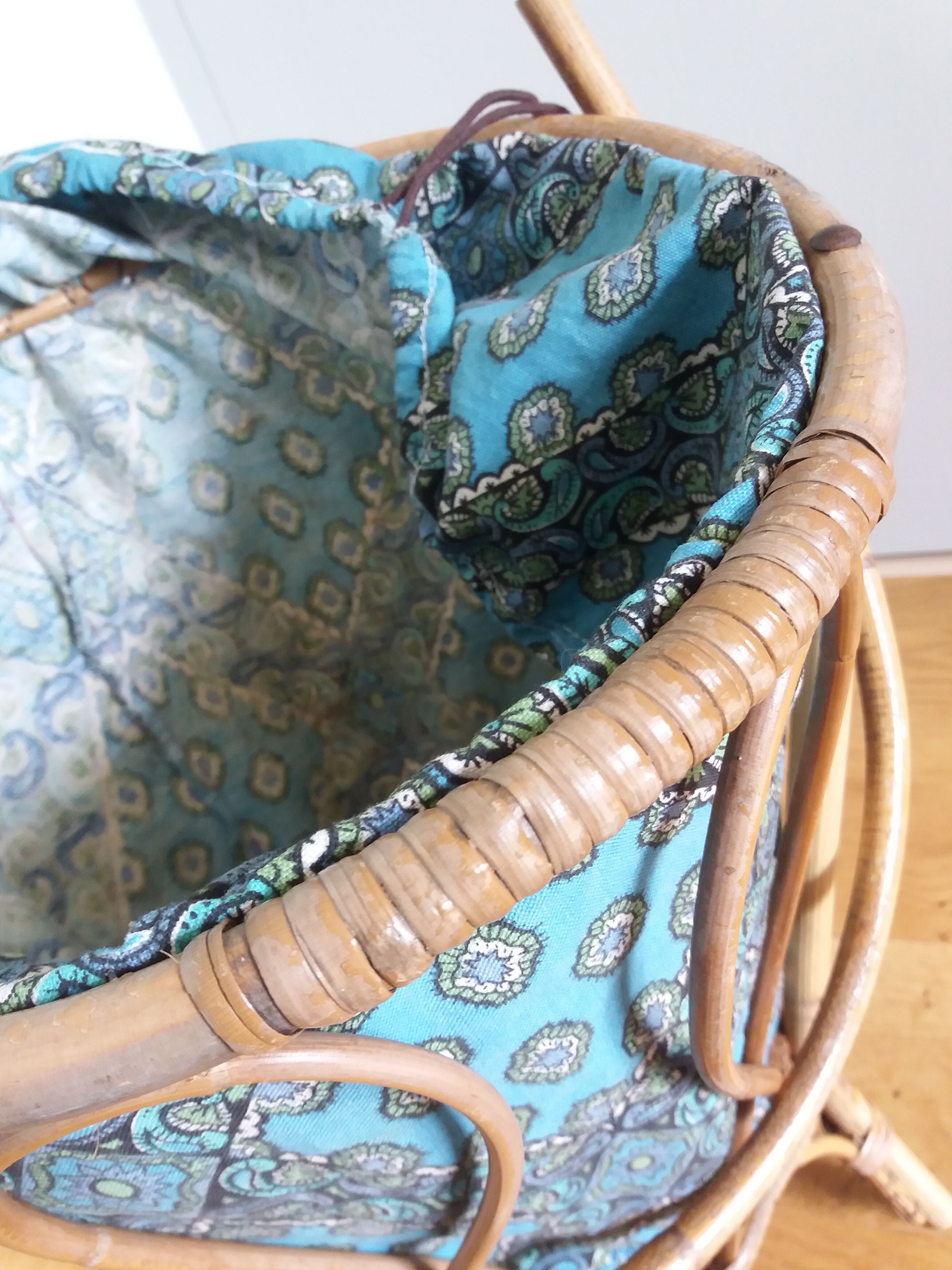 Wicker worker round basket with work, knitting