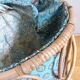 Wicker worker round basket with work, knitting
