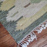 Green Scandinavian kilim carpet