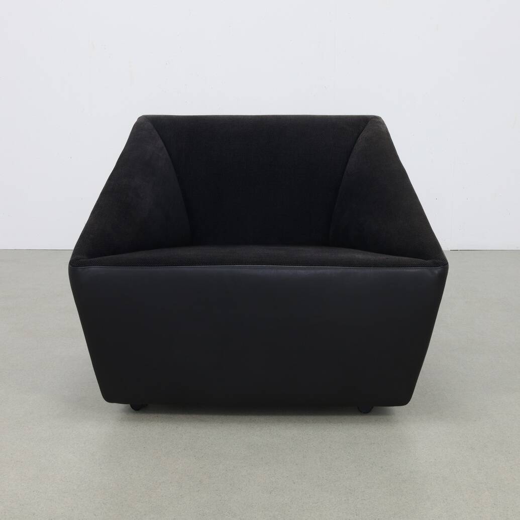 Postmodern Lounge Chair in Leather on wheels by COR