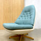 Vintage design swivel chair and ottoman