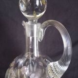 Wine carafe on foot, in cut and enameled glass