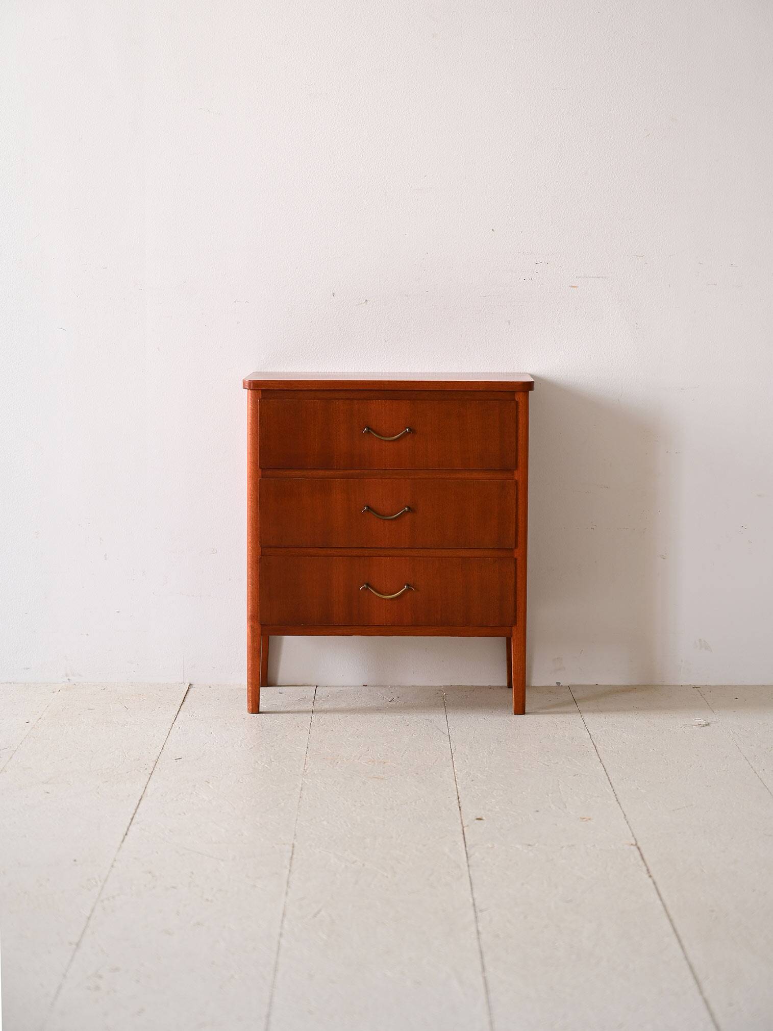 Mahogany chest of drawers with metal handles
