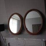 Pair of antique oval mirrors