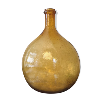Old red glass demijohn