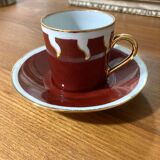 Hand-painted Limoges porcelain cup and saucer signed R. Blier