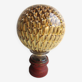 Baccarat's crystal stair railing ball, golden honeycomb décor