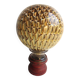 Baccarat's crystal stair railing ball, golden honeycomb décor