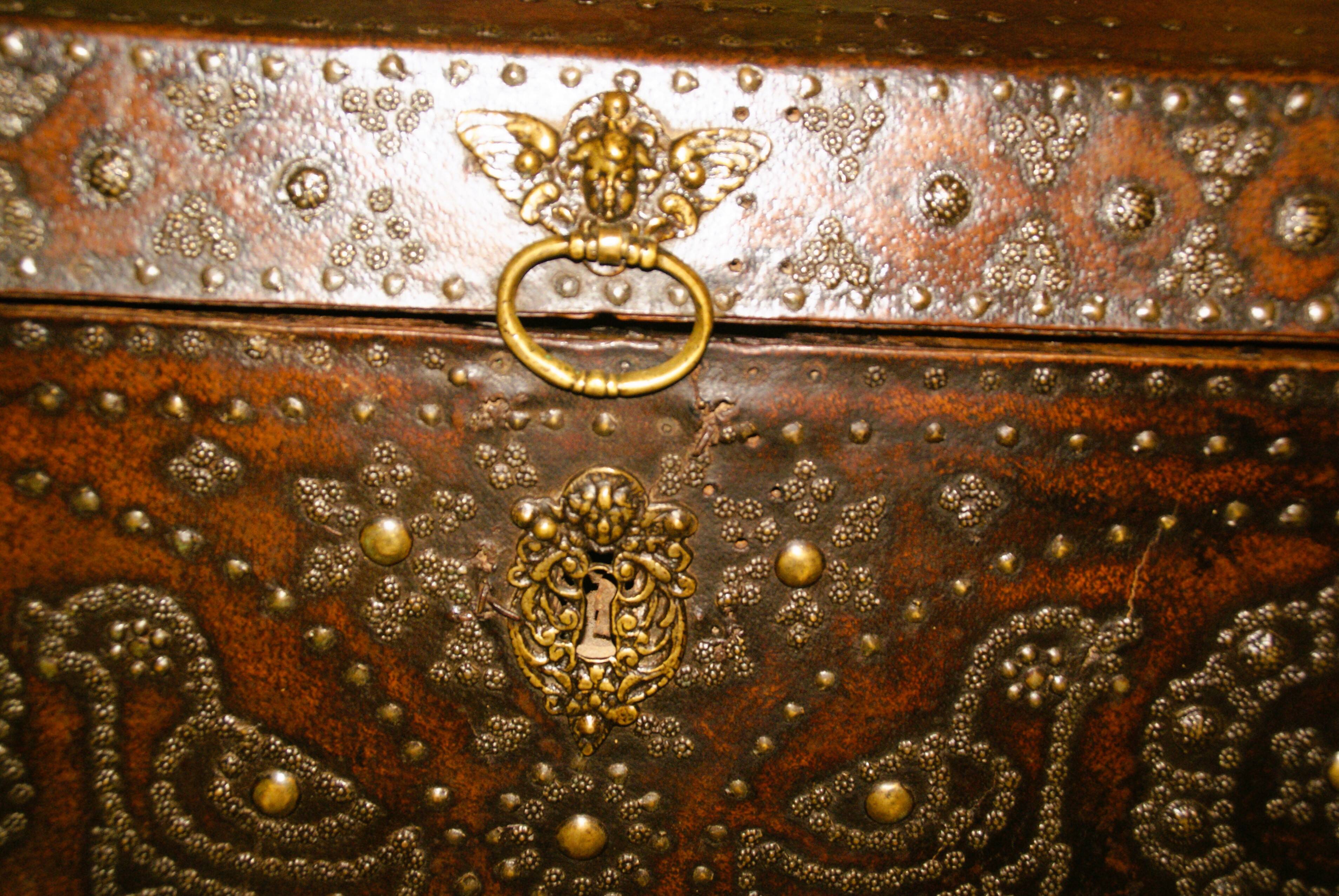 17th century studded leather travel trunk, richly decorated