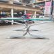 Vintage brushed steel coffee table and thick glass top - italian design