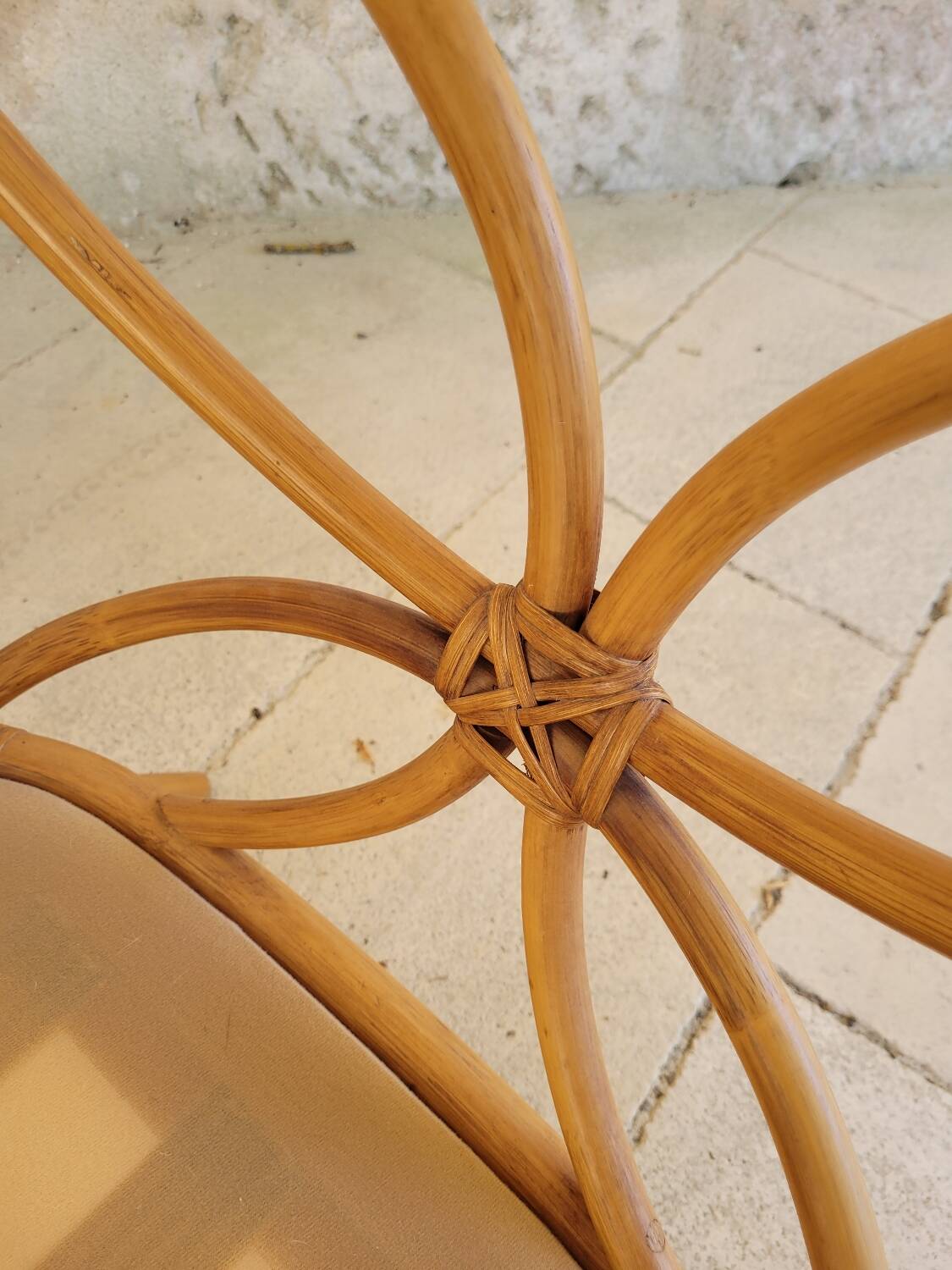 Two large rattan armchairs