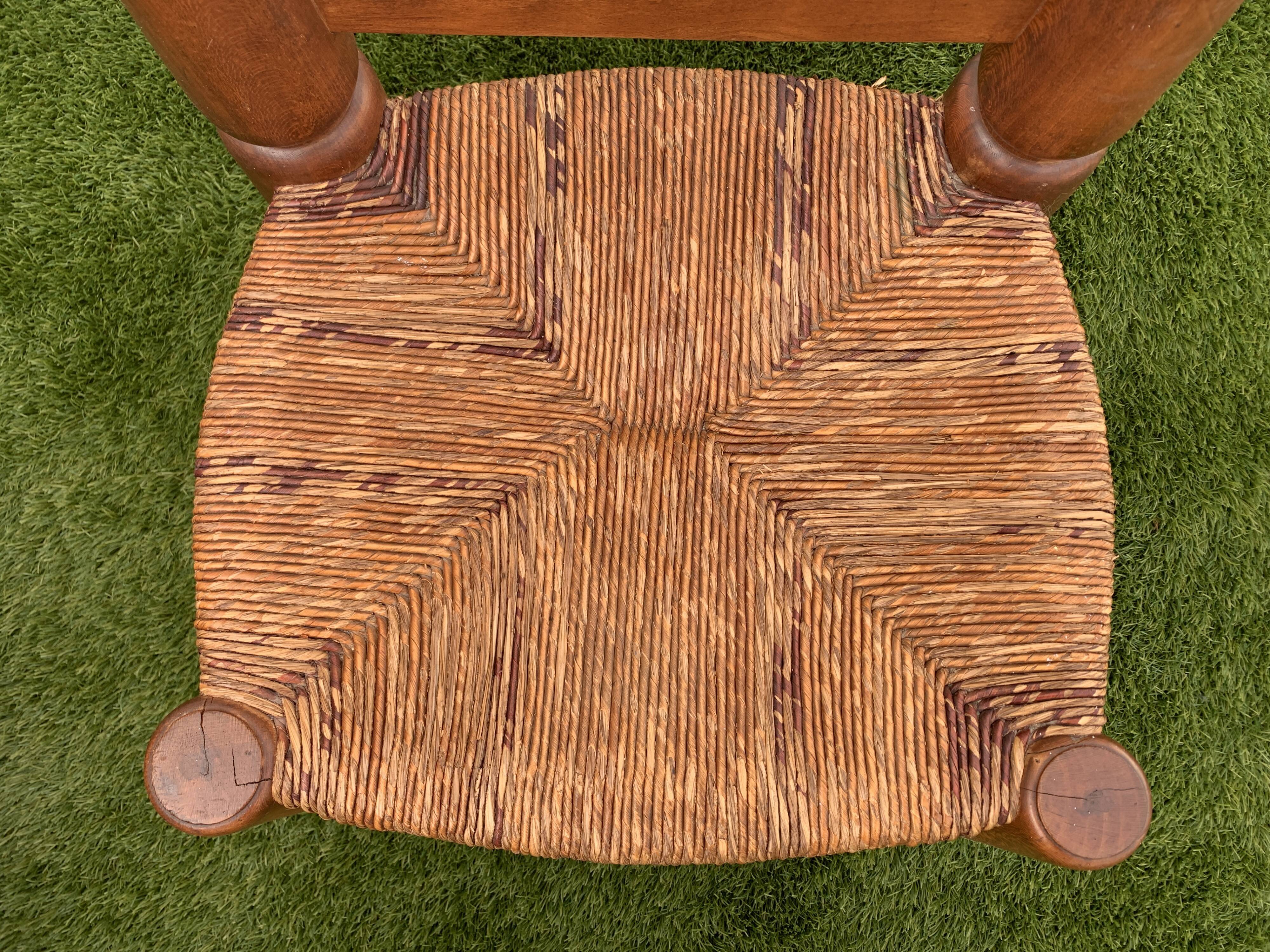 Pair of antique low fire chairs made of wood and straw