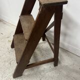 Library step stool with three steps in patinated beech, 20th century.