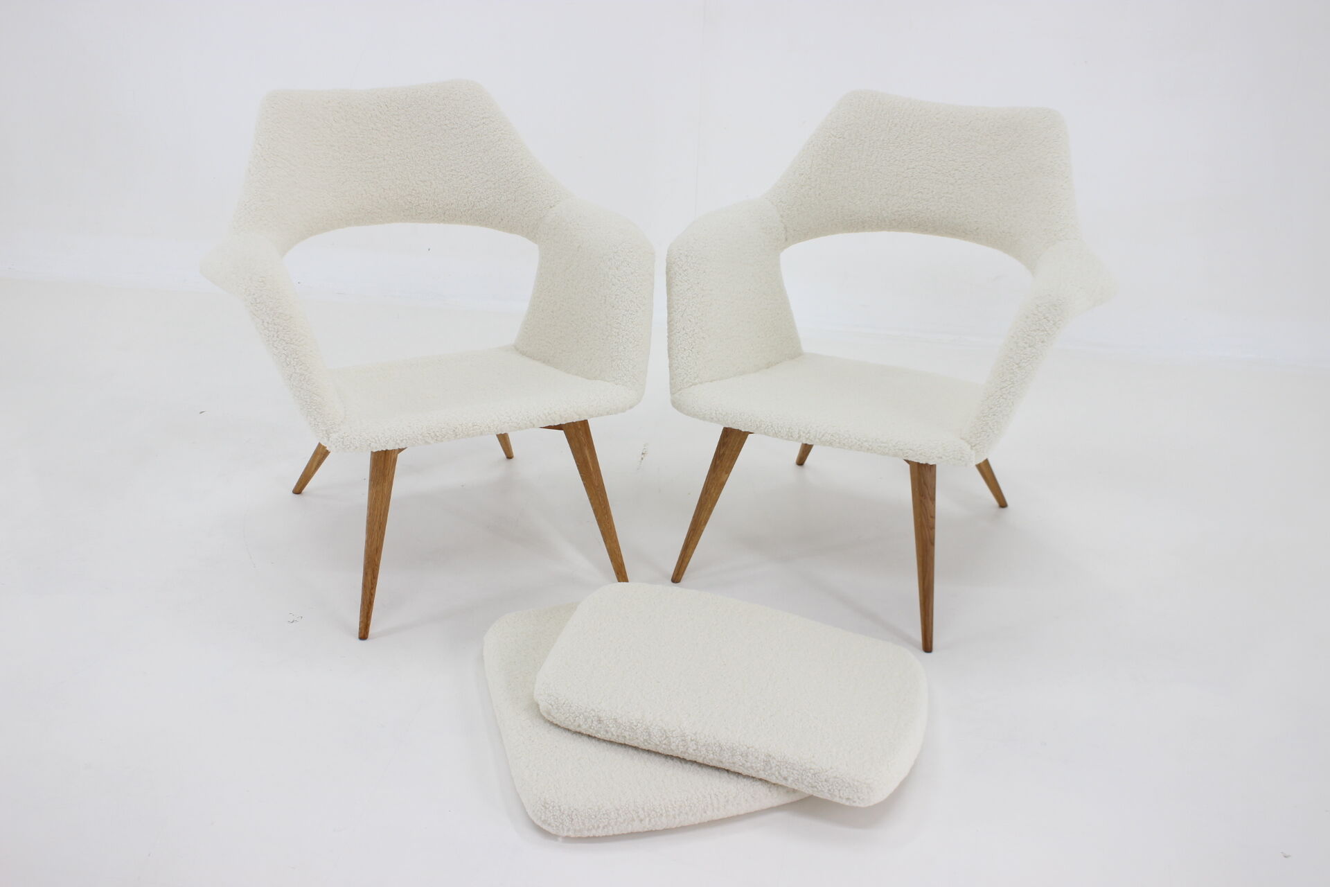 Pair of miroslav navratil shell lounge chairs in sheepskin fabric, czechoslovakia, 1960