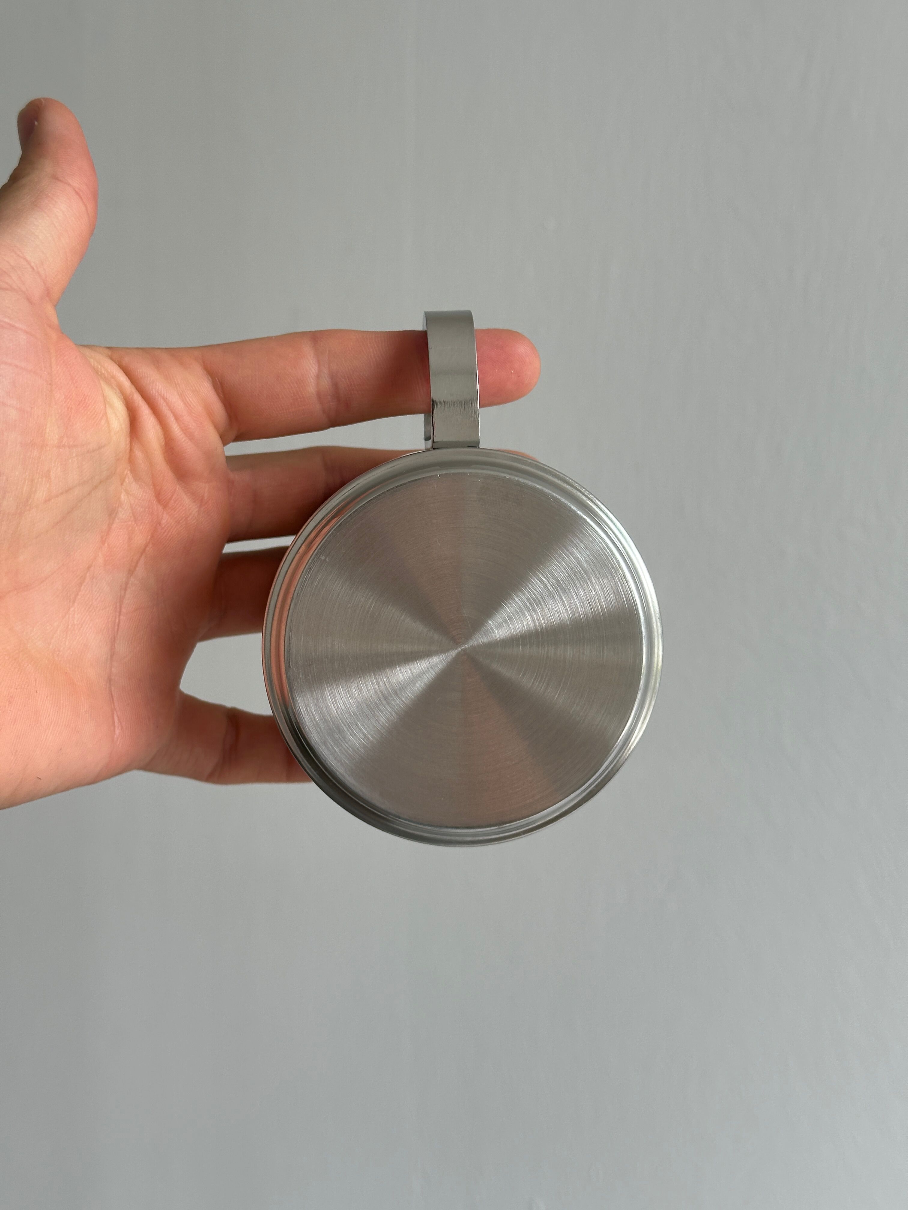 set of 4 stackable stainless steel coffee cups with saucers
