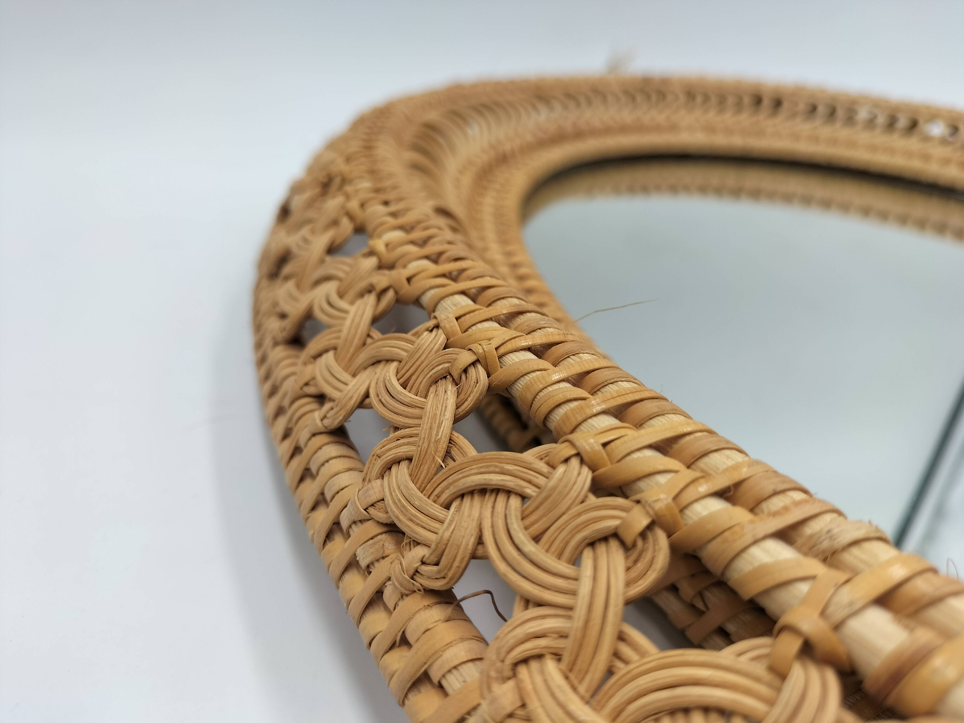 Oval rattan mirror