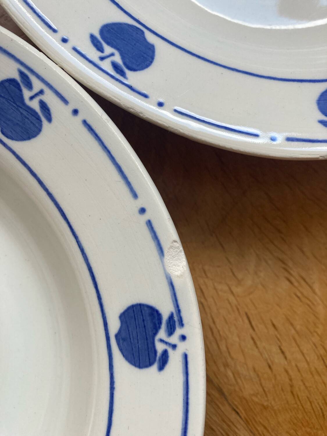 Deep plates with blue apple pattern