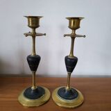 Pair of brass and black hard stone candlesticks