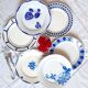 Old mismatched earthenware dinner plates