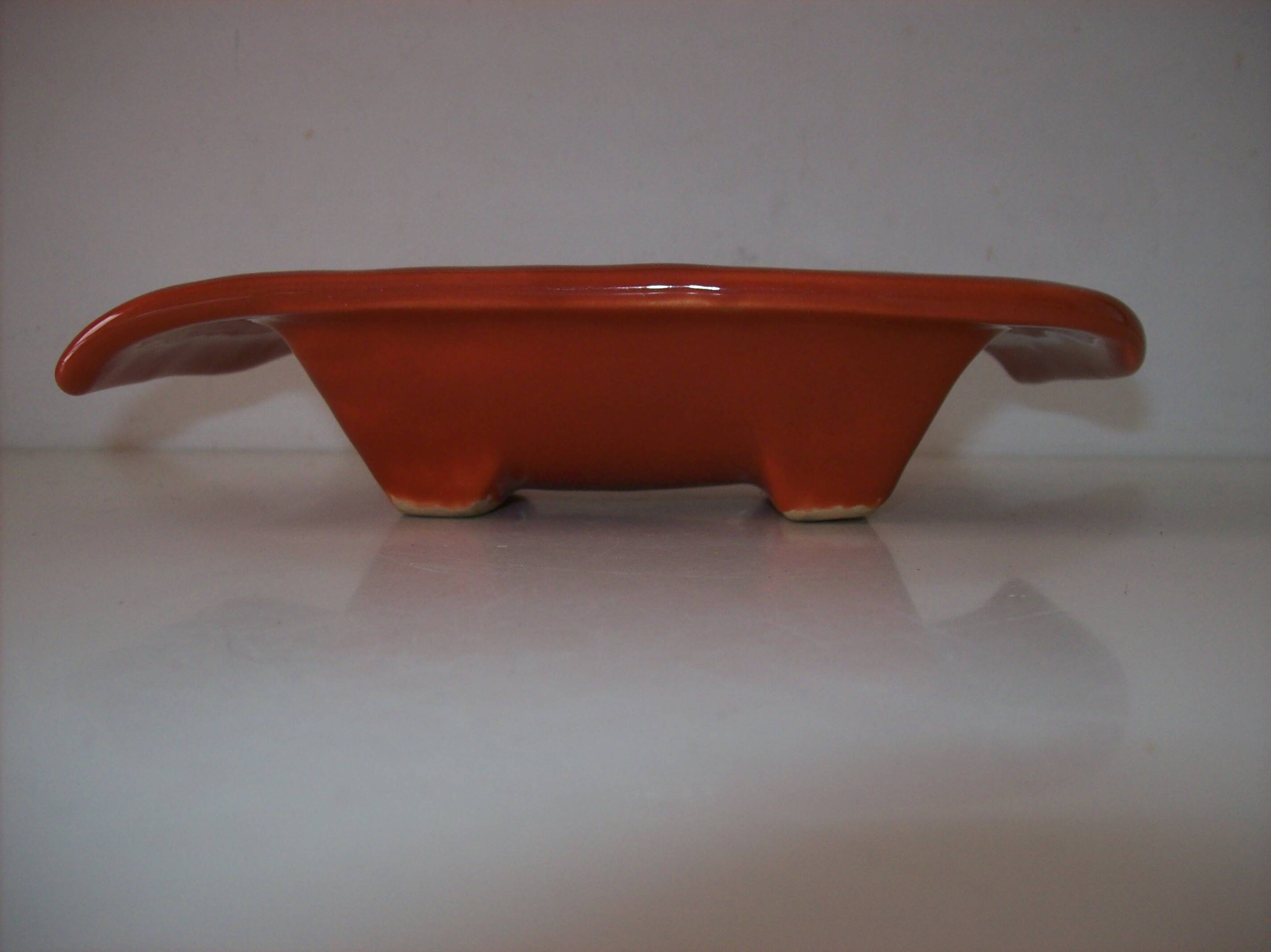 Free-form ceramic catchall