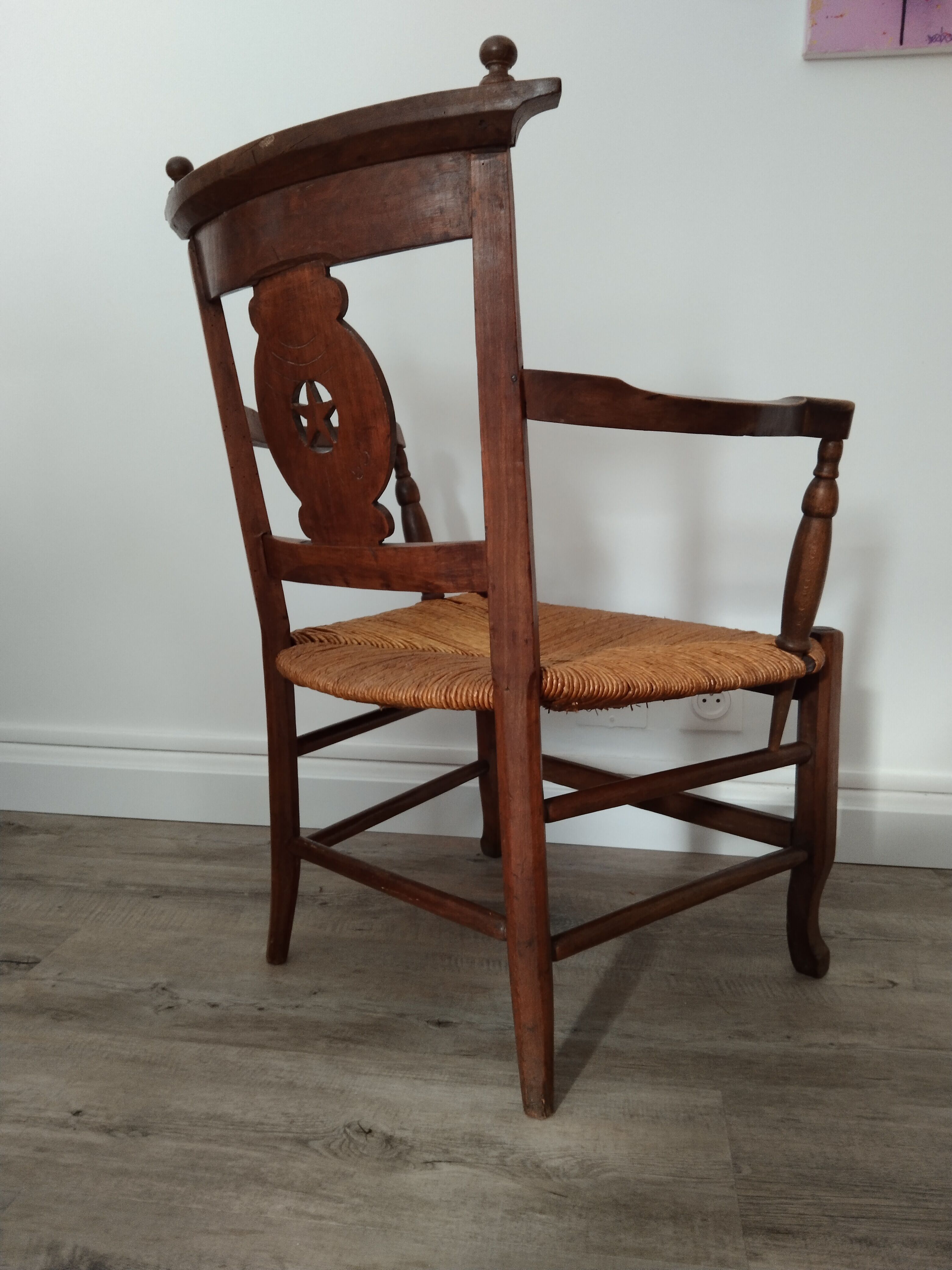 Straw armchair folk art.