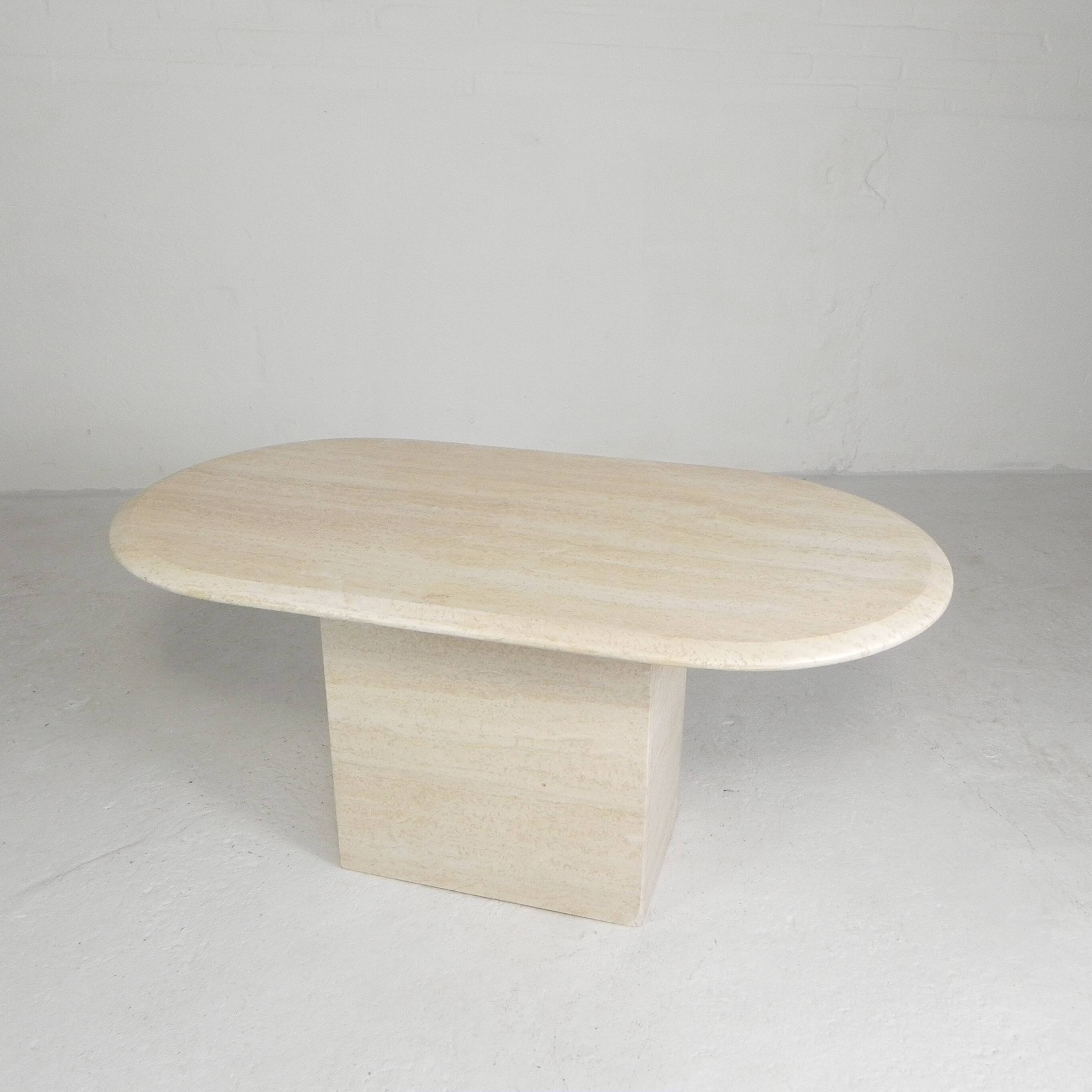 Mid-Century travertine coffee table with an oval top, 1970s.