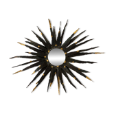 Large brutalist sun mirror in patinated metal with gold accents, 1970.
