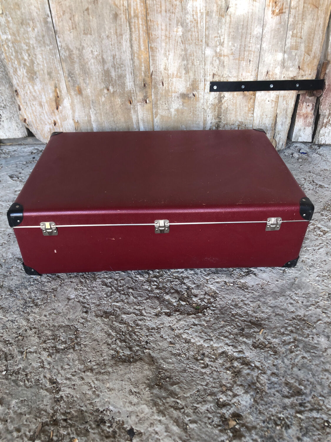 Old suitcase red cardboard bordeaux clasp metal vintage
