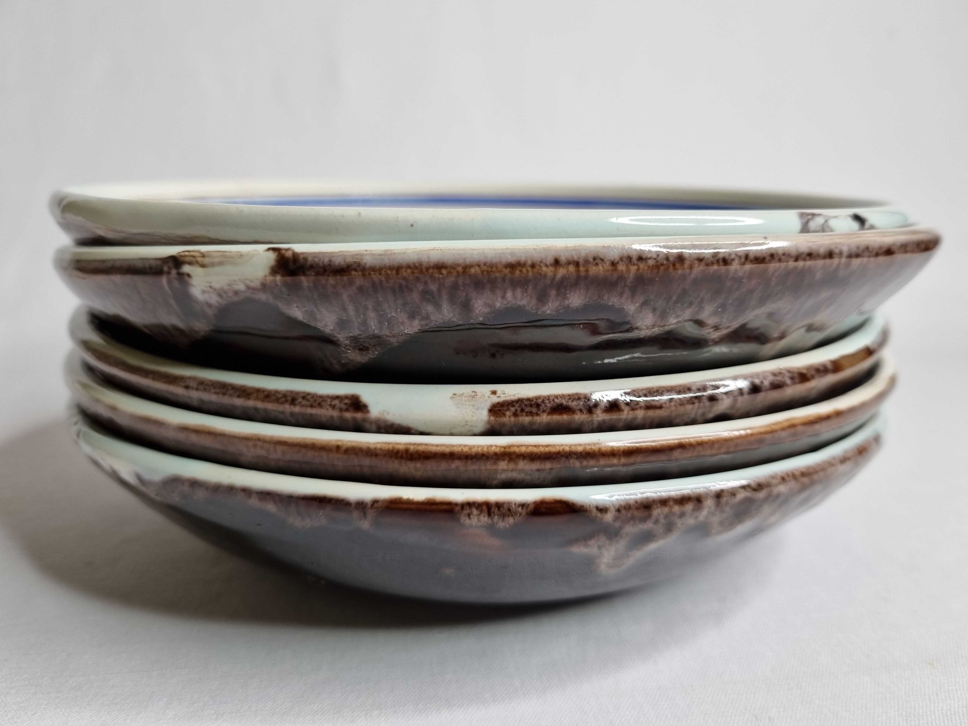 Set of five old hollow plates in glazed ceramic, nineteenth century, 23 cm