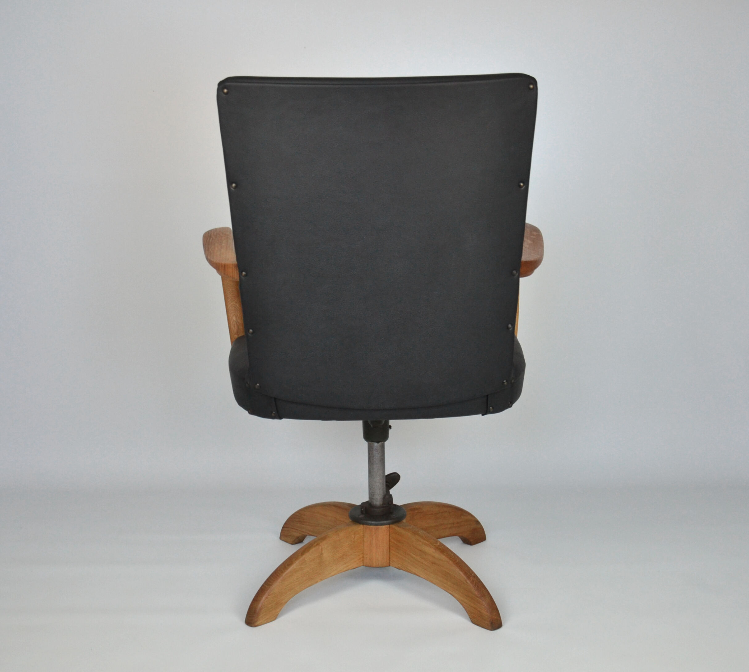 Antique black leather and oak desk chair 1900s, Sweden