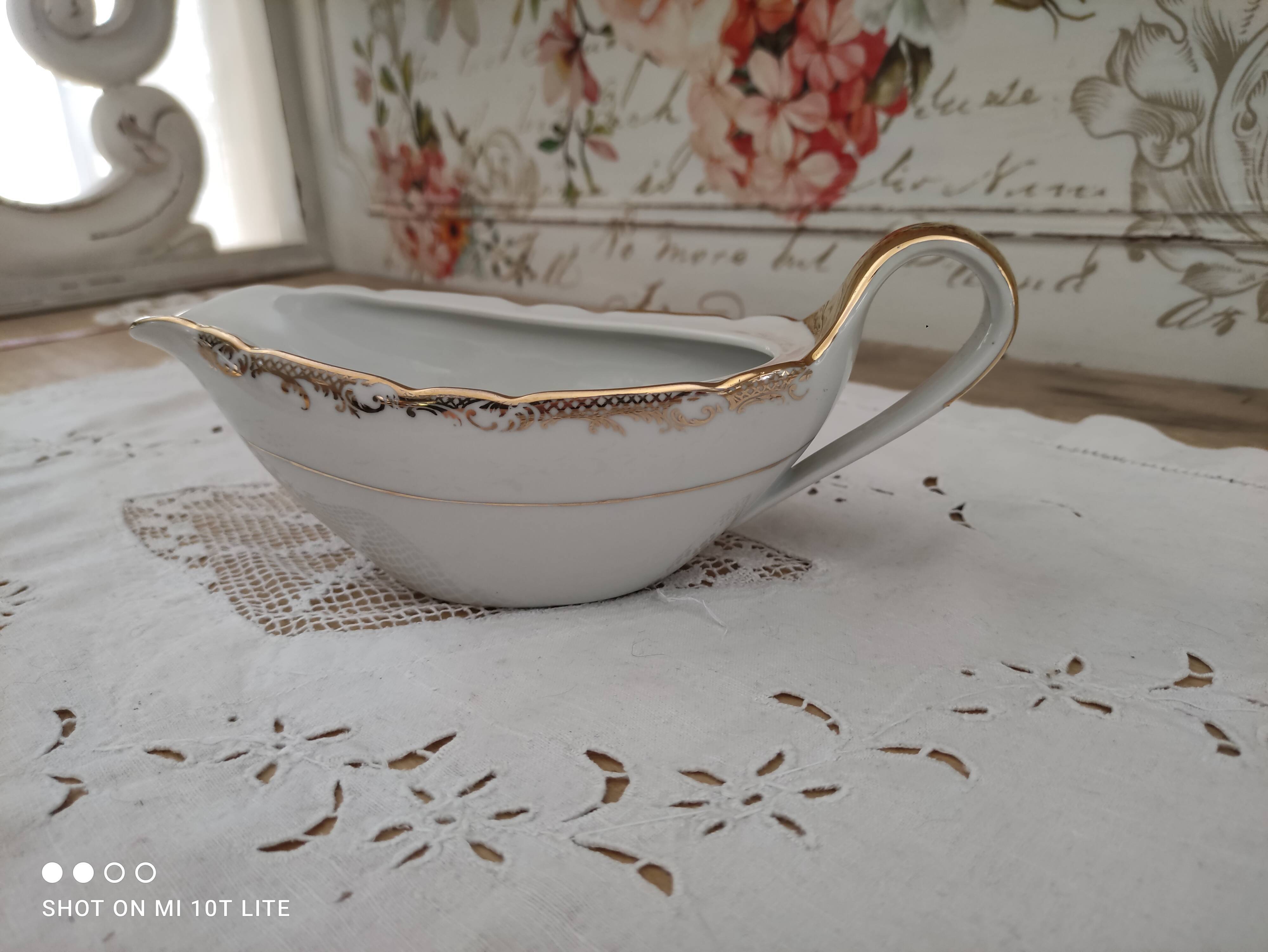 White porcelain saucière evor france frieze golden crosses