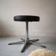 Low rotating stool star pietement in imitation black leather, 1970