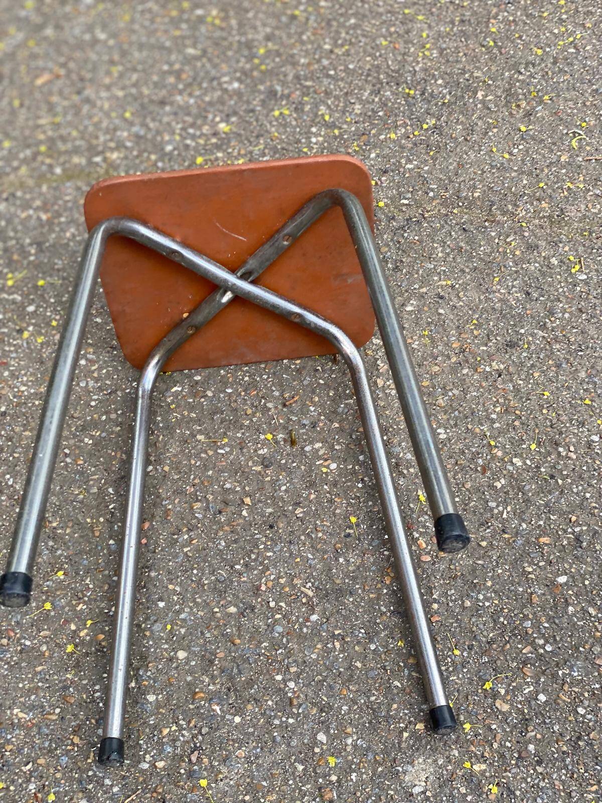 Vintage square stool in steel and brown leather.