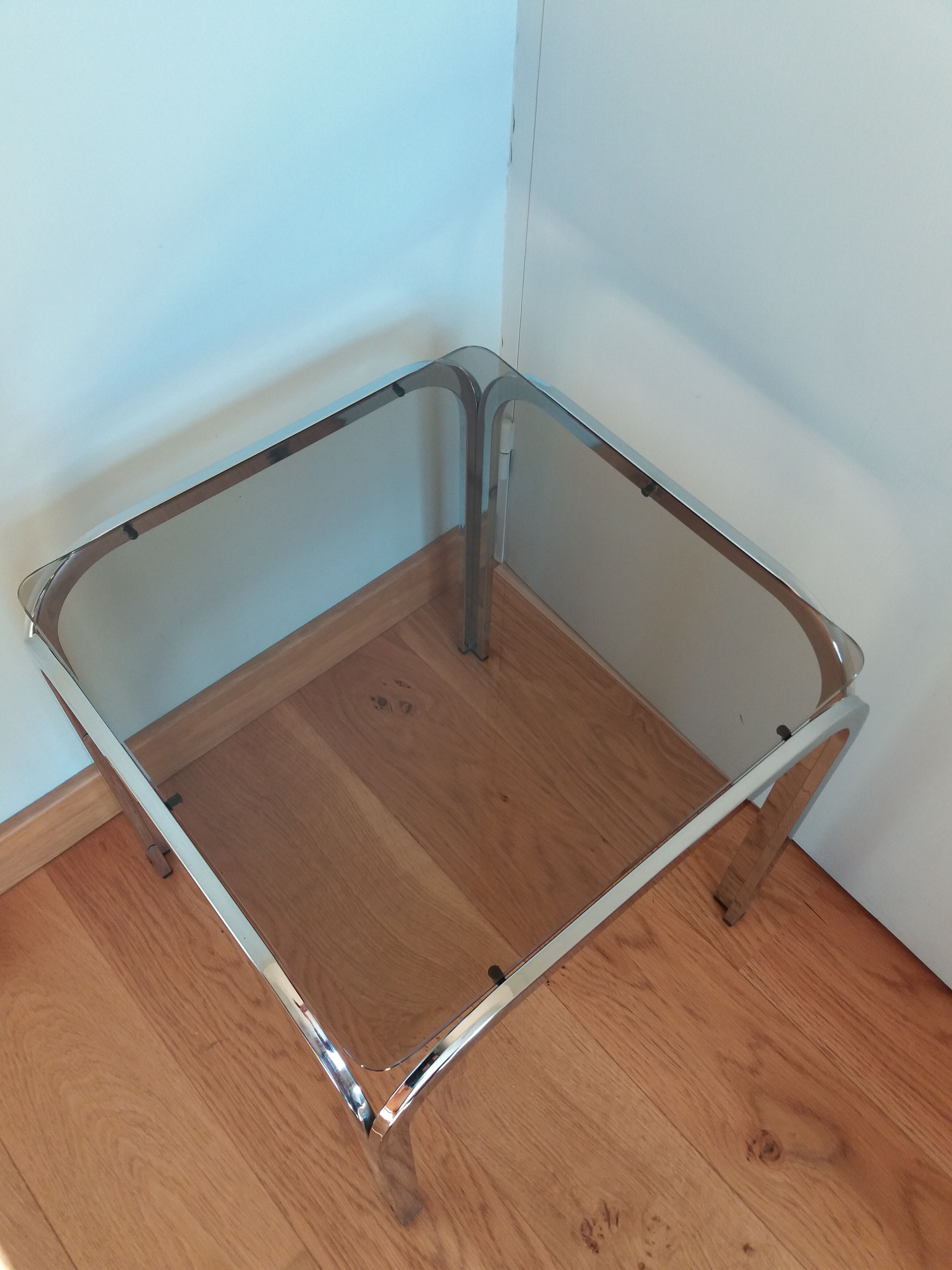 Square coffee table in chromed metal and smoked glass