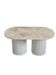 Oval coffee table in travertine and white fluted wood.