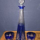 Cobalt blue double crystal service, consisting of a decanter and two matching glasses.