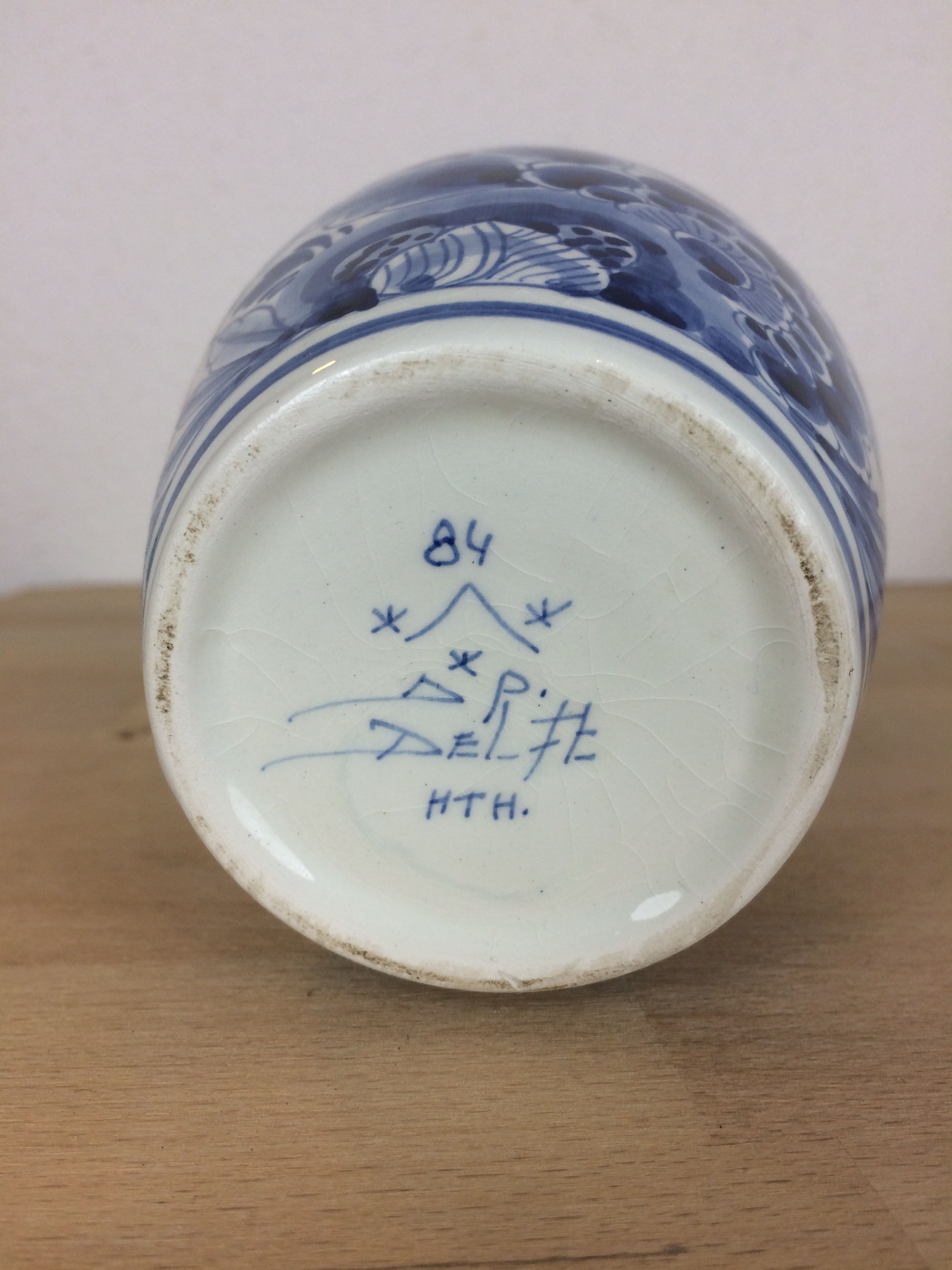Delft earthenware vase with blue flowers