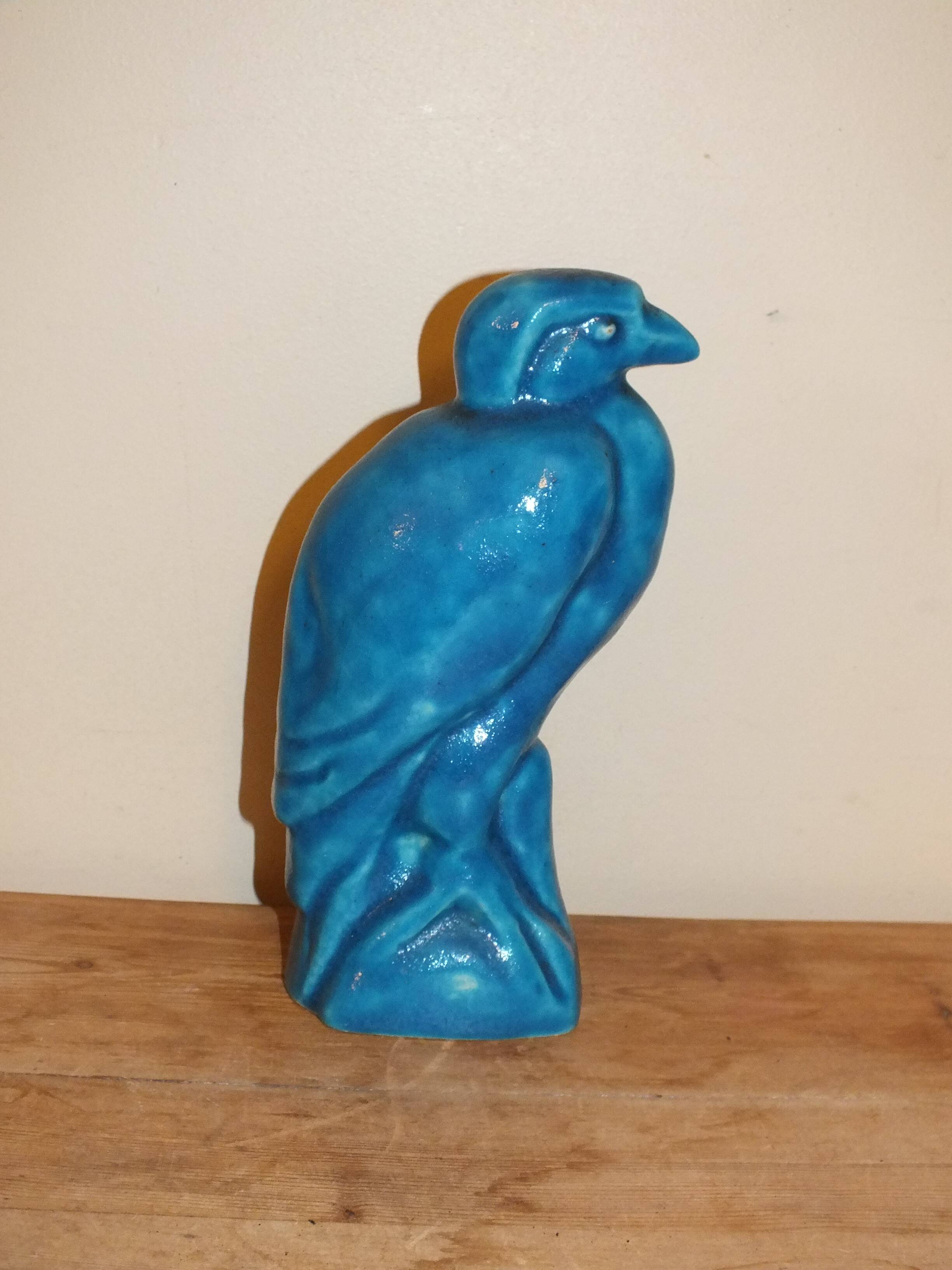 Bird, cracked blue raptor in ceramic