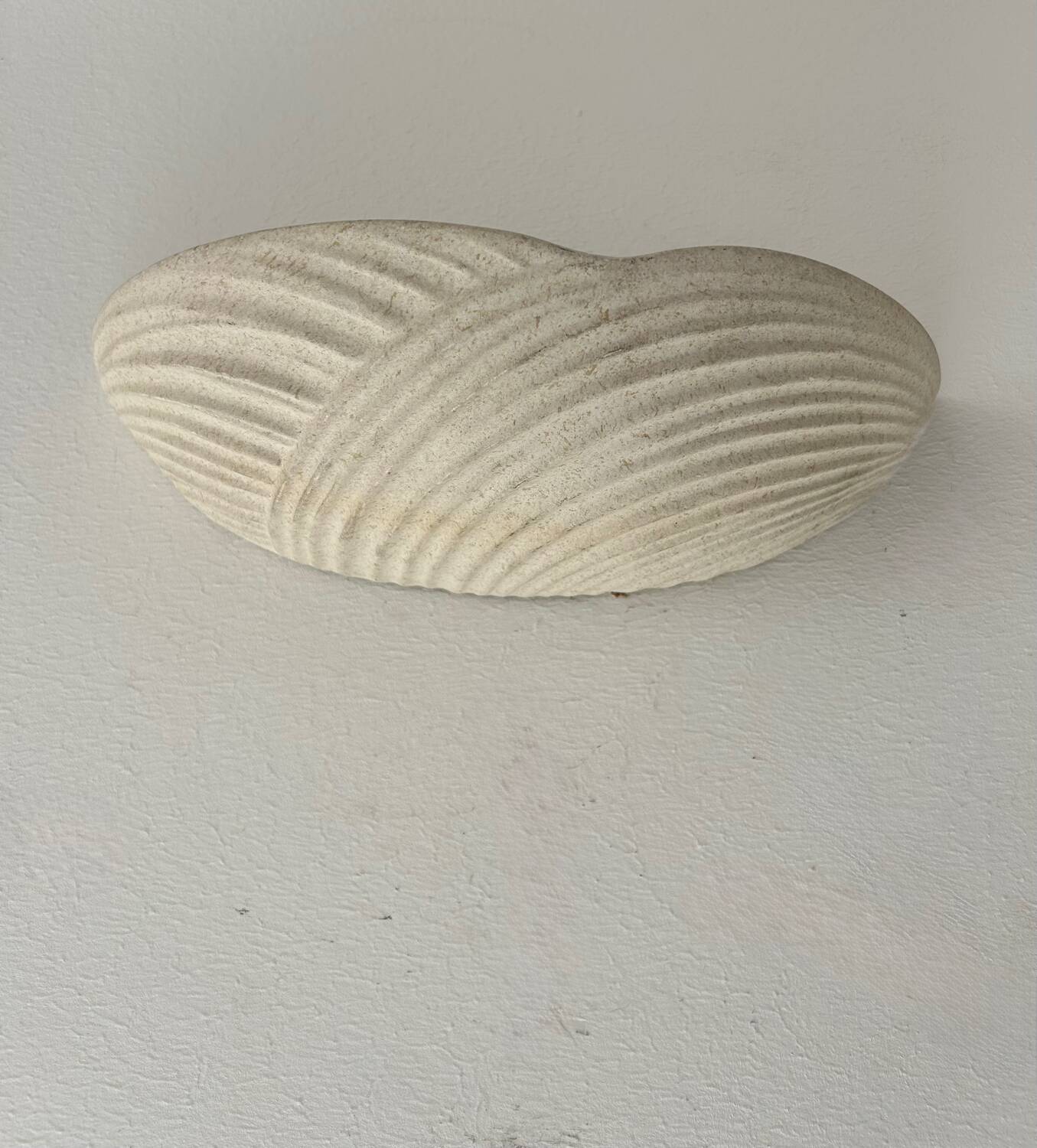 Pair of vintage speckled beige plaster wall lights, France 1970s