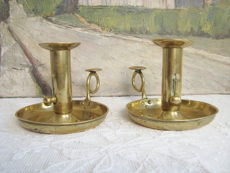 Pair of old brass candlesticks