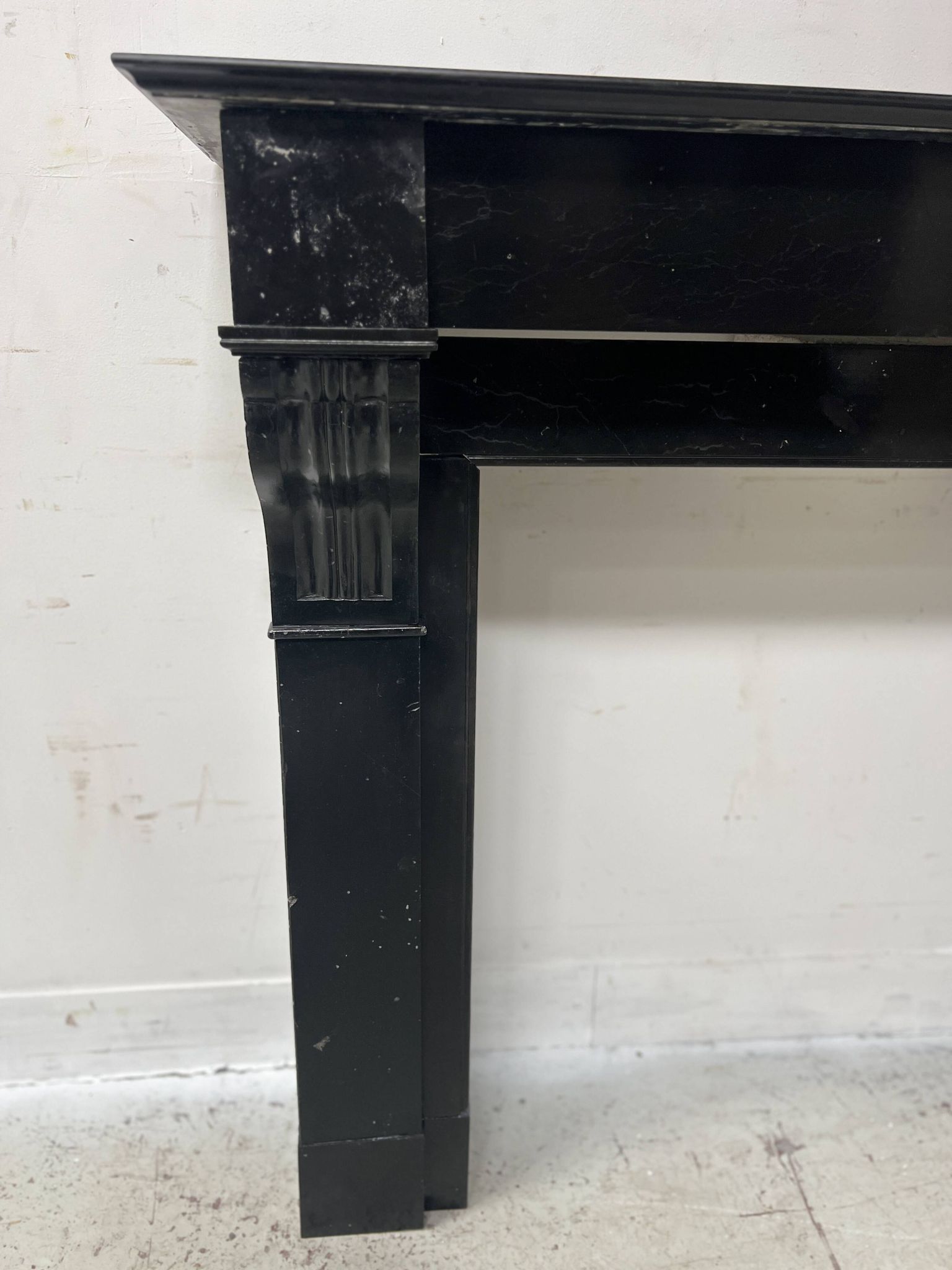 Napoleon III period fireplace with a black marble corbel. 19th century.