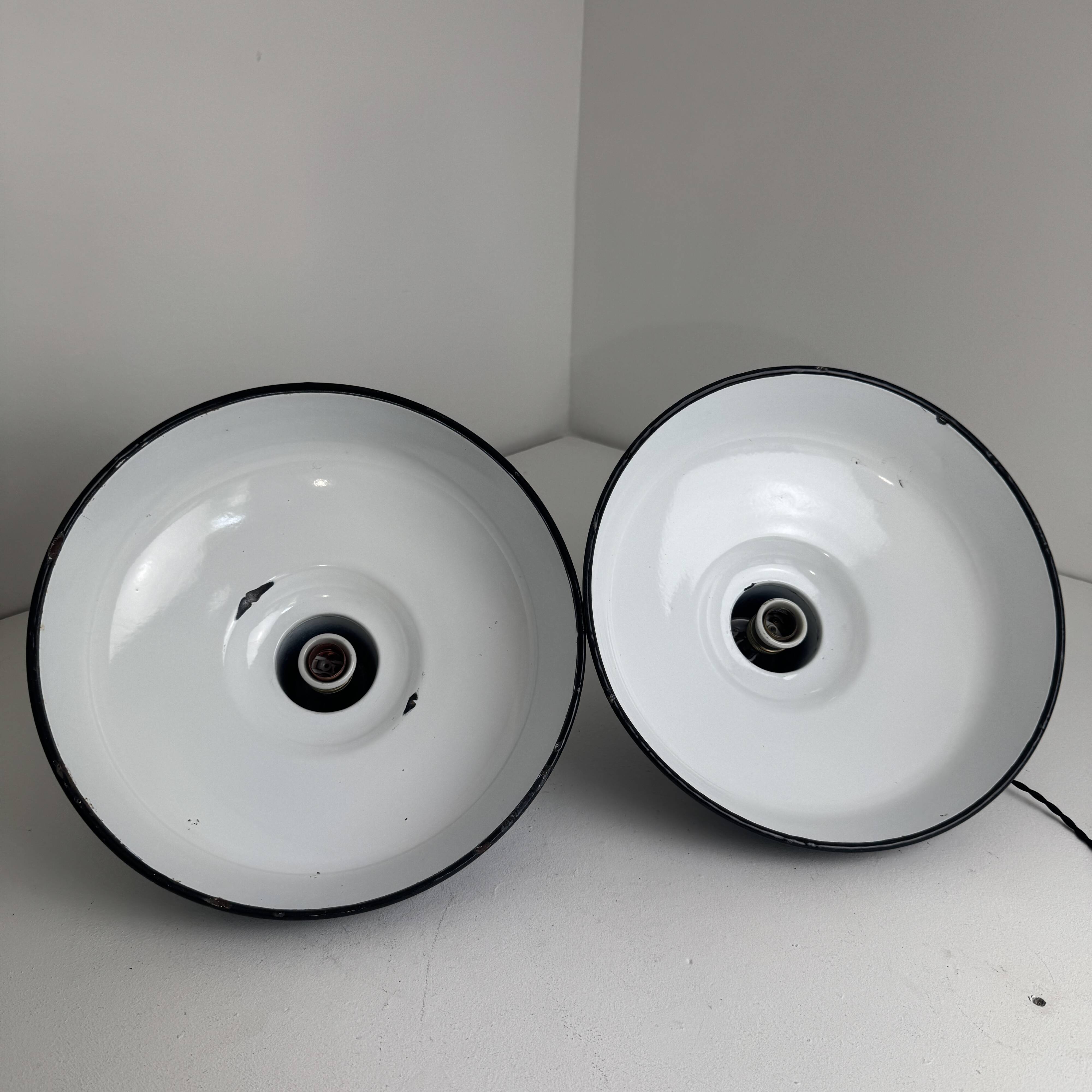 Pair of antique enamelled industrial workshop suspensions