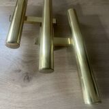 Tubular wall sconces in brass, Italian design from the 1970s, attributed.