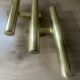 Tubular wall sconces in brass, Italian design from the 70s, attributed to