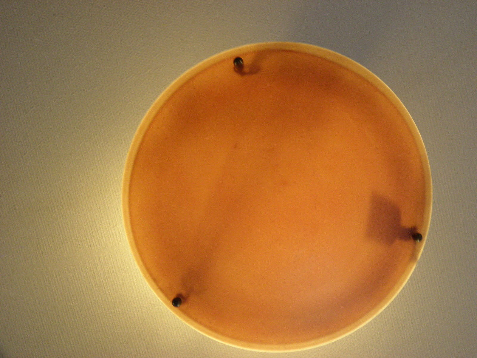 Suspension with orange glass bowl