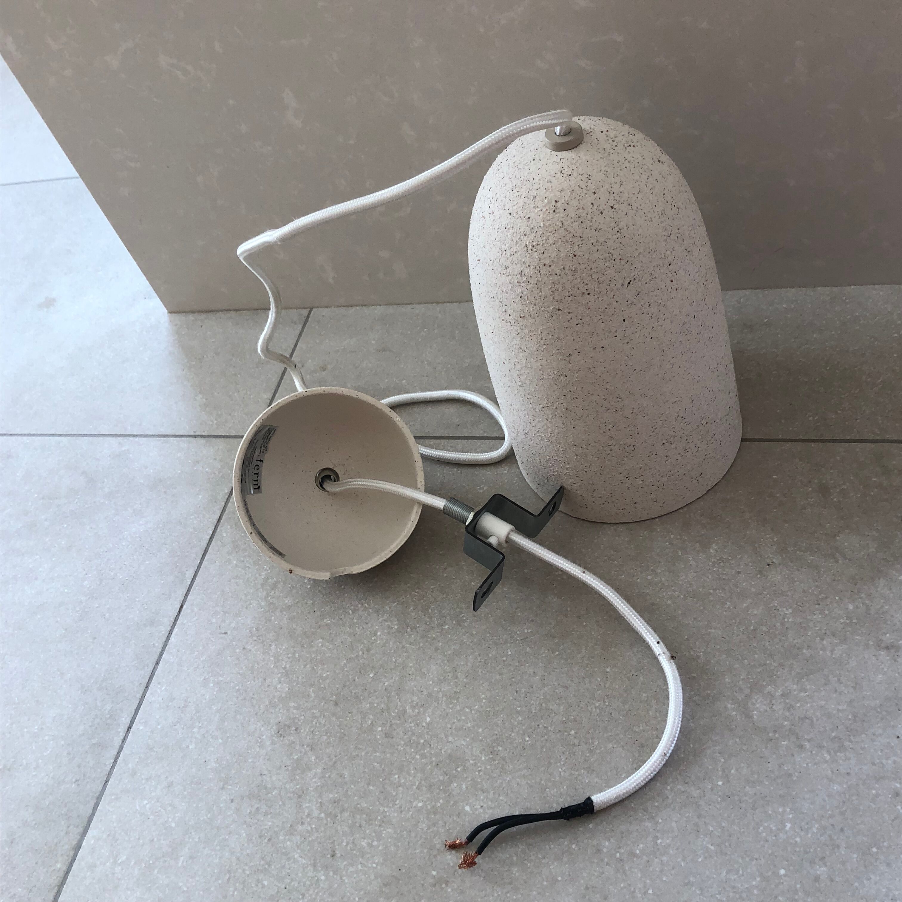 Speckled white ceramic suspended light fixture