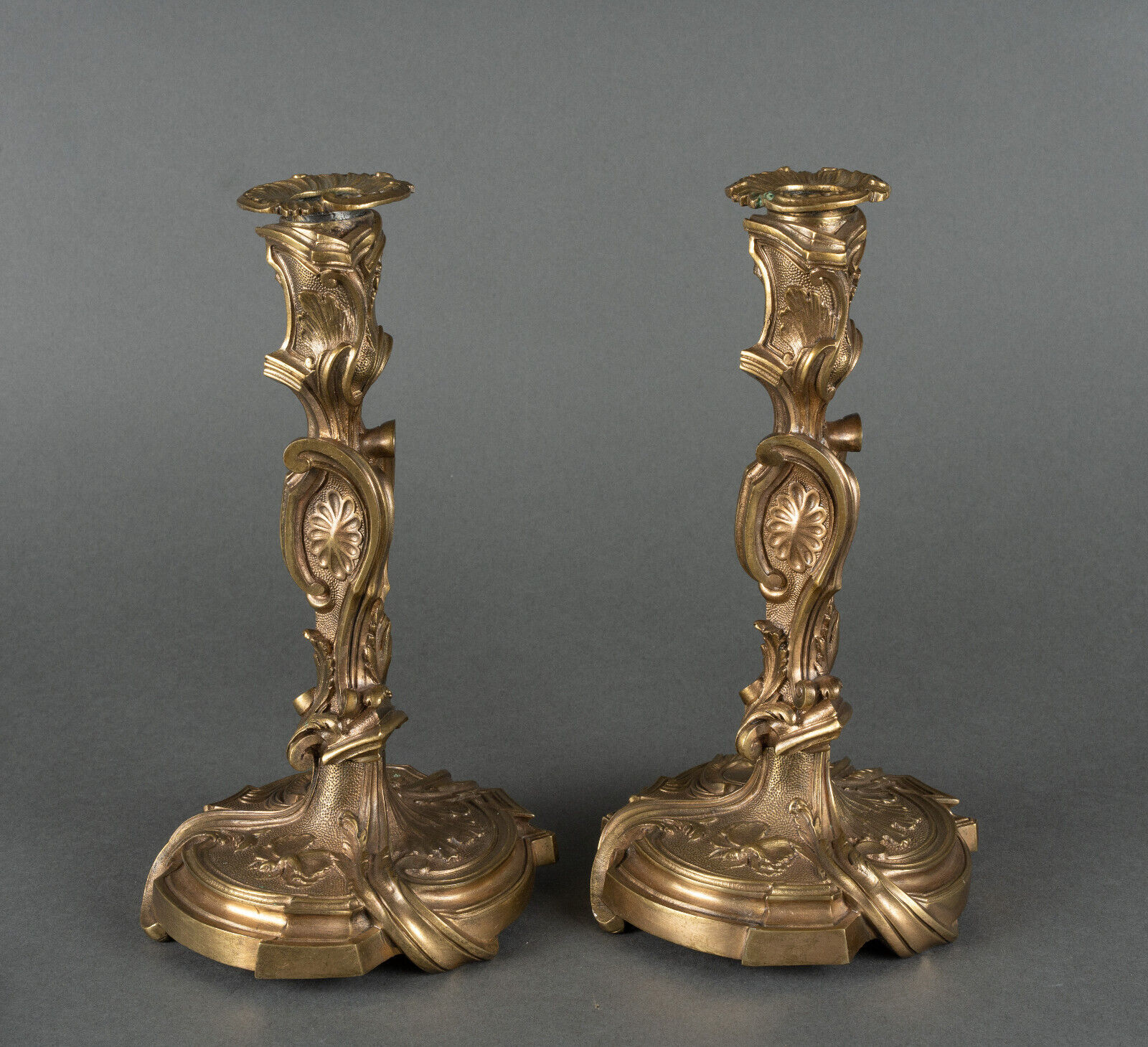 Pair of candlesticks xixth louis xiv ornamentation shells gilded bronze
