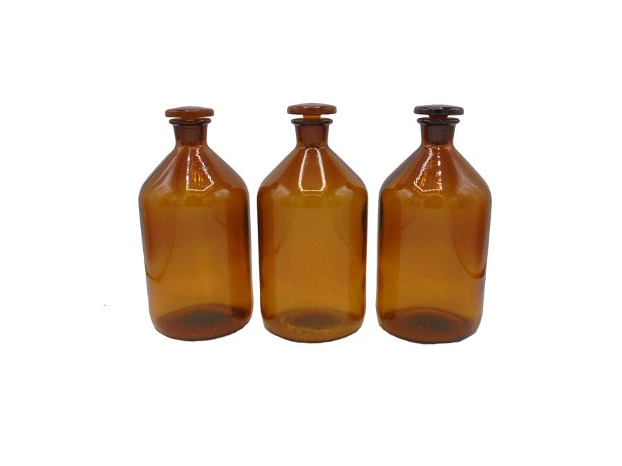 Trio of apothecary bottles