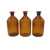 Trio of apothecary bottles