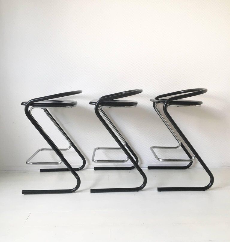 Set of three bar stools black and chrome of Thema Italy to the 1970s
